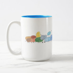 Bicolor Criaturas Esponjosas y Adorables en una Taza de Ca