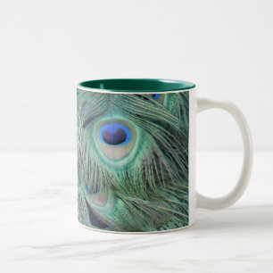 Bicolor El pavo real empluma la taza