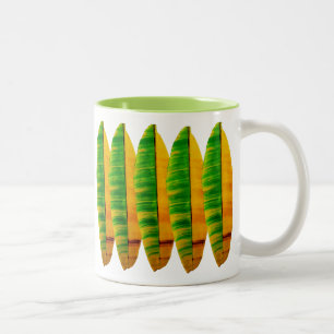 Bicolor El plátano hojea taza