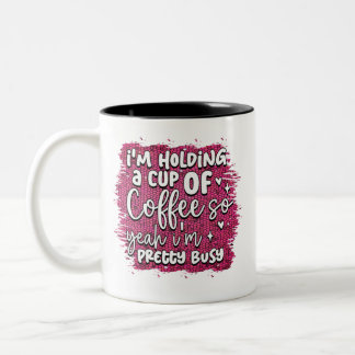 Bicolor Estoy sosteniendo una taza de café