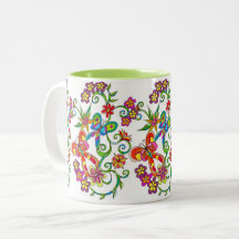 Flores y taza de la mariposa de Leslie Clair Bures