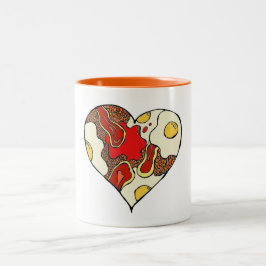Bicolor Fritada encima de la taza del corazón