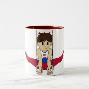 Bicolor Gimnasta lindo en la taza de los anillos
