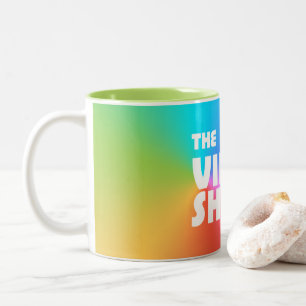 Bicolor La taza video de la tienda
