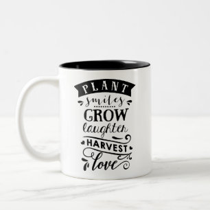 Bicolor Las sonrisas de la planta crecen la taza de café