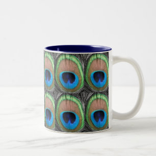 Bicolor Los ojos del pavo real tejaron la taza