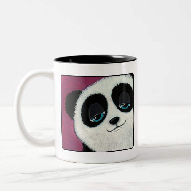 Bicolor Panda linda en la taza rosada (Izquierda)