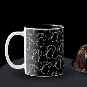 Bicolor Taza con patrón de ángel vengador en negro y blanc