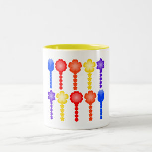 Bicolor Taza con patrón de flores abstractas vibrantes