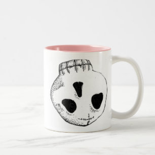 Bicolor Taza de papel del cráneo