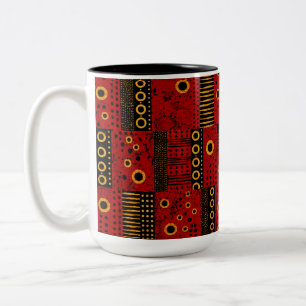 Bicolor Taza de patchwork tribal con explosión solar roja
