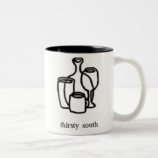 Bicolor Taza del sur sedienta del logotipo