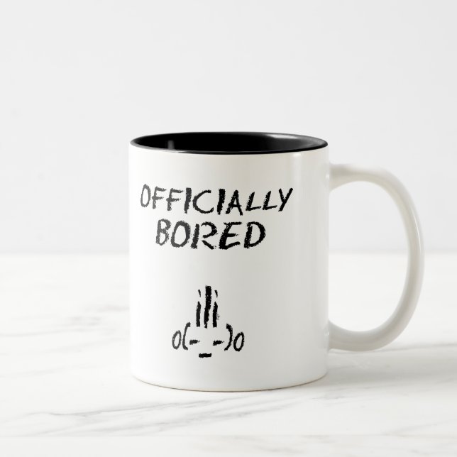 Bicolor Taza oficialmente agujereada (Derecha)