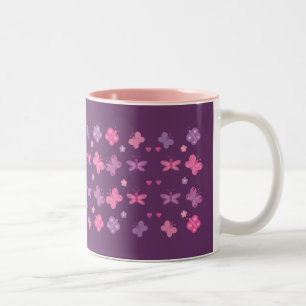Bicolor Taza rosada y púrpura bonita con las mariposas de