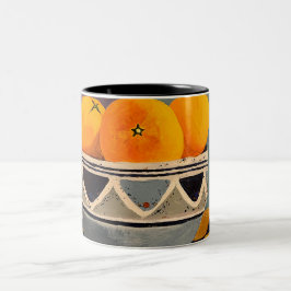 Bicolor Una magnífica taza con naranjas pintando el diseño