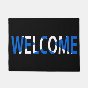 Bienvenida sobre la alfombra de la puerta de la ba