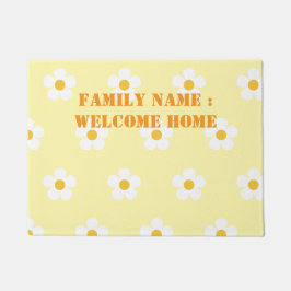 Bienvenido a casa fuera de la alfombra de la puert