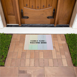 Bienvenido a casa fuera de la alfombra de la puert