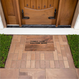 Bienvenido a casa fuera de la alfombra de la puert