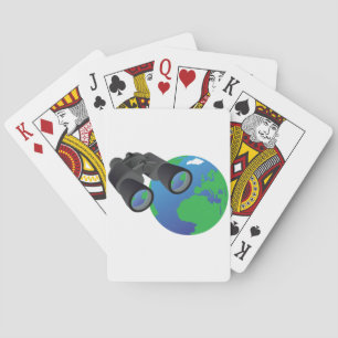 Binoculares y cartas de juego de la Tierra