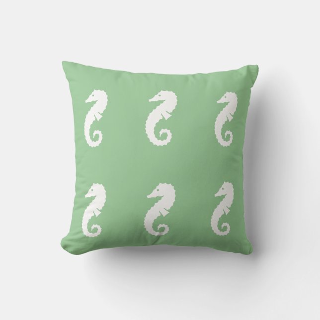 BLANCO SEAHORSE sobre almohada VERDE SEAFOAM (Anverso)