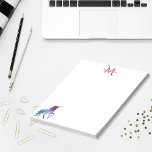 Bloc De Notas Blanco morado de unicornio monogramado<br><div class="desc">Un unicornio fantástico de color turquesa,  morado y un poco rosado. Fondo blanco. Plantilla para Su nombre una letra monograma en color púrpura y rosa.</div>