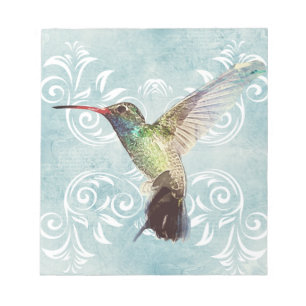 Bloc De Notas Colibrí con fondo floreciente
