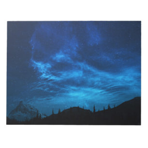BLOC DE NOTAS ESTRELLAS LUMINOSAS EN UN CIELO OSCURO Y AZUL