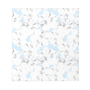 Bloc De Notas Flores blancas en azul claro.
