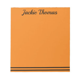 Bloc de notas naranja y negro