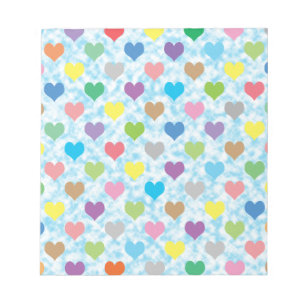 Bloc De Notas Patrón de corazones coloridos sobre fondo azul