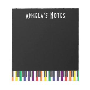 Bloc De Notas Teclas de piano de arcoíris sobre negro
