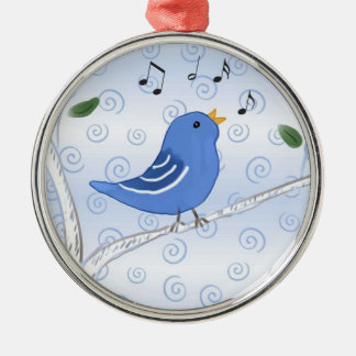 Bluebird lindo del canto en un ornamento de la