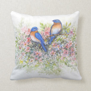 Bluebirds y almohada de los flores