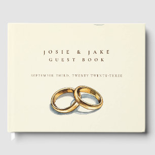 Boda eterno libro de invitados con anillos de oro