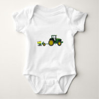 Tractor verde con el carro del plantador