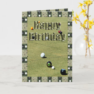 Bolas de hierba con tarjeta de cumpleaños enmarcad