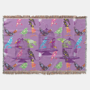 Bolas de pájaros púrpuras y manta de hilados morad