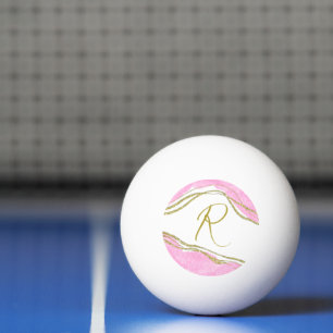 Bolas de ping pong monogramadas rosadas y doradas