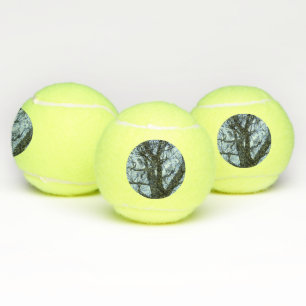 Bolas de tenis con fotografías de silueta de árbol