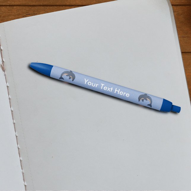 Bolígrafo De Tinta Azul Purpurina Mira Delfines Blancos Oscuros Saltando (Shiny dark blue white dolphins jumping on light blue writing pens.)