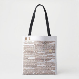 Bolsa con Monograma y la página de un periódico es