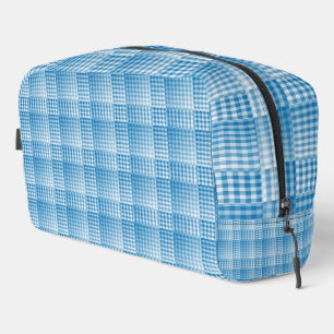 Bolsa de aseo con patrón abstracto de cuadros azul