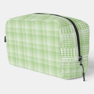 Bolsa de aseo con patrón abstracto de cuadros verd