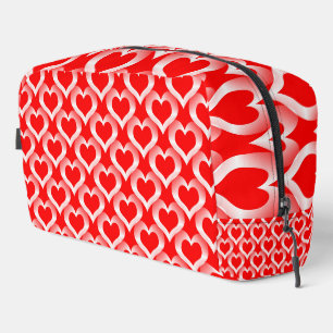 Bolsa de aseo con patrón de corazones rojos y blan