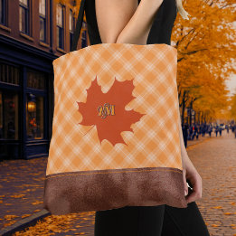 Bolsa de cuadros de otoño con hoja de arce persona
