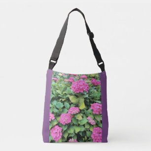 Bolsa de cuerpo cruzado de flores rosadas todo sob