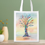 Bolsa De La Compra Árbol arcoiris personalizado<br><div class="desc">Estas bolsas reutilizables están decoradas con un árbol familiar de mosaicos en los colores del arcoiris sobre un fondo acuático. Fácilmente personalizable con tu nombre. Utilice la opción Personalizar adicional para cambiar el tamaño, estilo o color del texto si lo desea. Porque creamos nuestra propia obra de arte no encontrarás...</div>