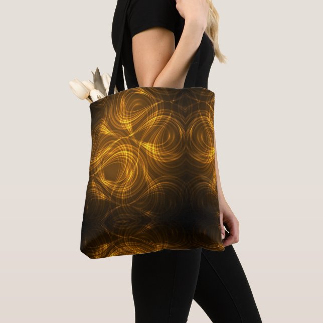 Bolsa de mano con patrones de luz dorada arremolin (Detalle)