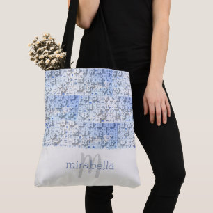 Bolsa de mano con piezas de rompecabezas monograma